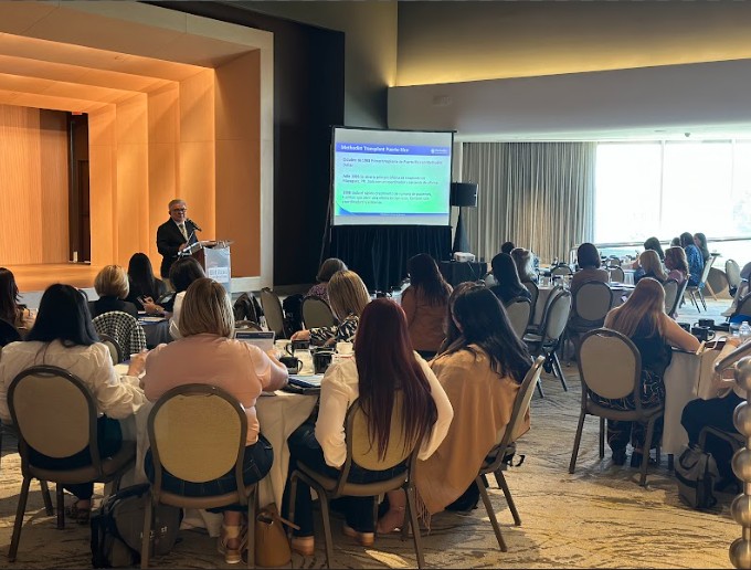 One of the doctors at the conference showing a powerpoint presentation