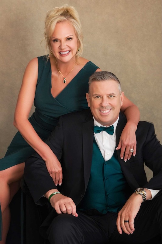 Joe Gammon and his wife posing for the camera